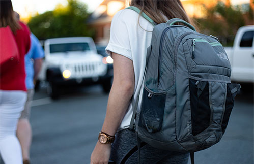student with a backpack
