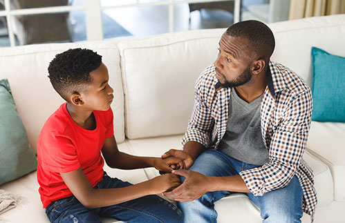dad and son talking